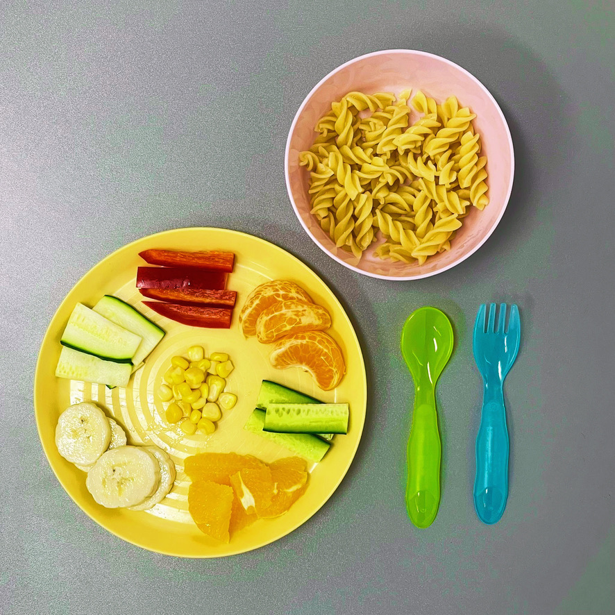 Avoid squeezies and eat food in traditional forms off a plate for better speech development