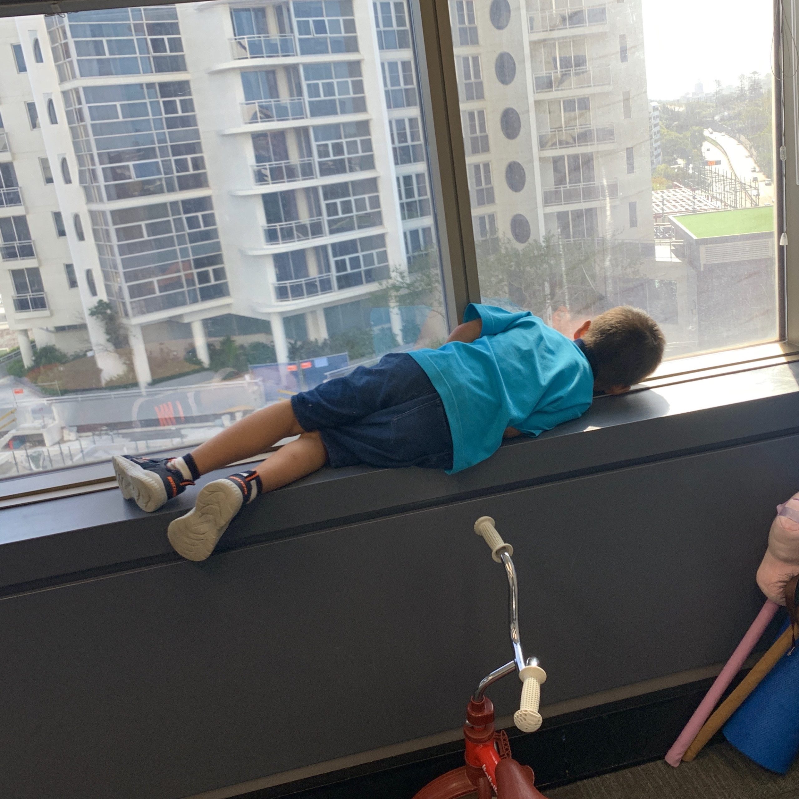 A child who has trouble sitting still at school does an occupational therapy session in Bondi Junction