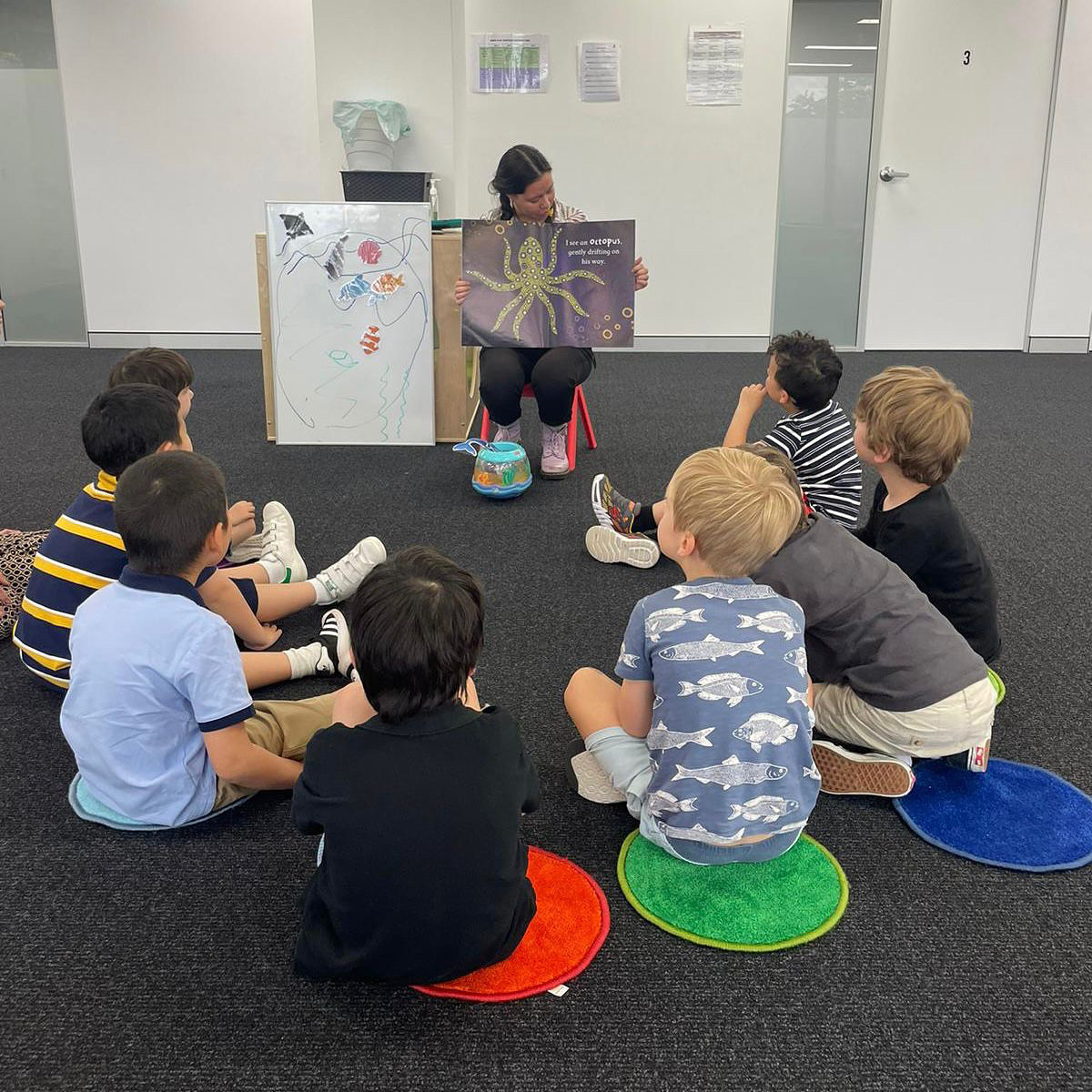 Group of boys lesrning social skills in play based occupational therapy in bondi junction and mascot